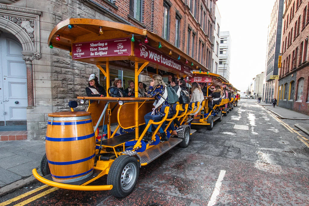 A bustling street filled with people riding bikes, showcasing the vibrant atmosphere of Wee Toast Tours.
